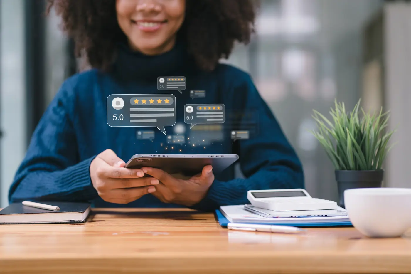 Woman happily using a tablet, surrounded by digital icons, reflecting positive online reviews and engagement.