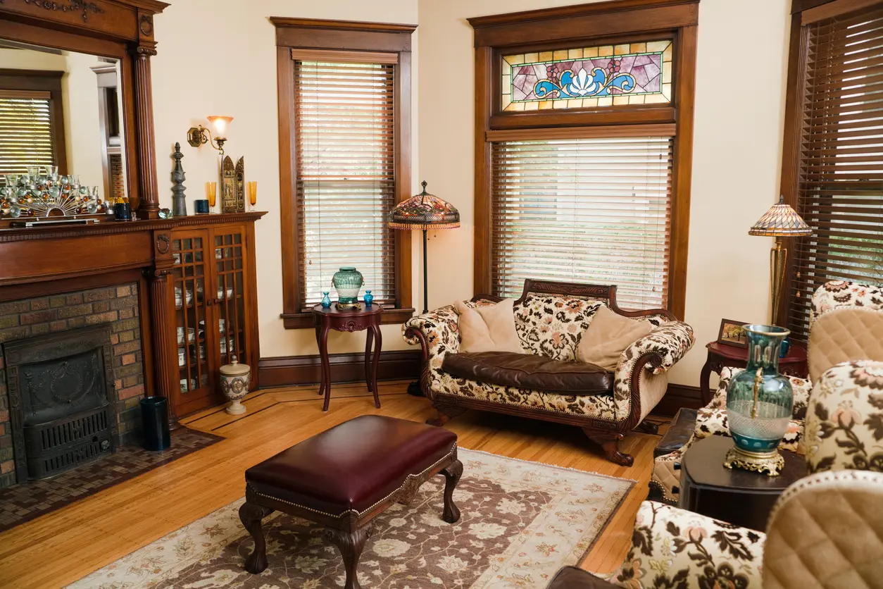 Living room featuring a stylish fireplace and unique decor elements, creating a warm and inviting atmosphere.