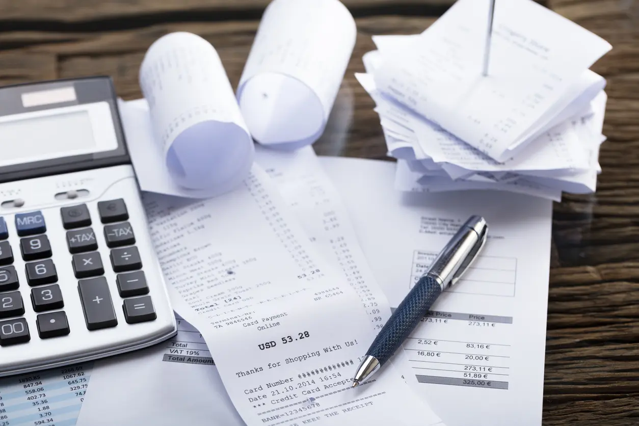 Calculator And Pen On Receipt