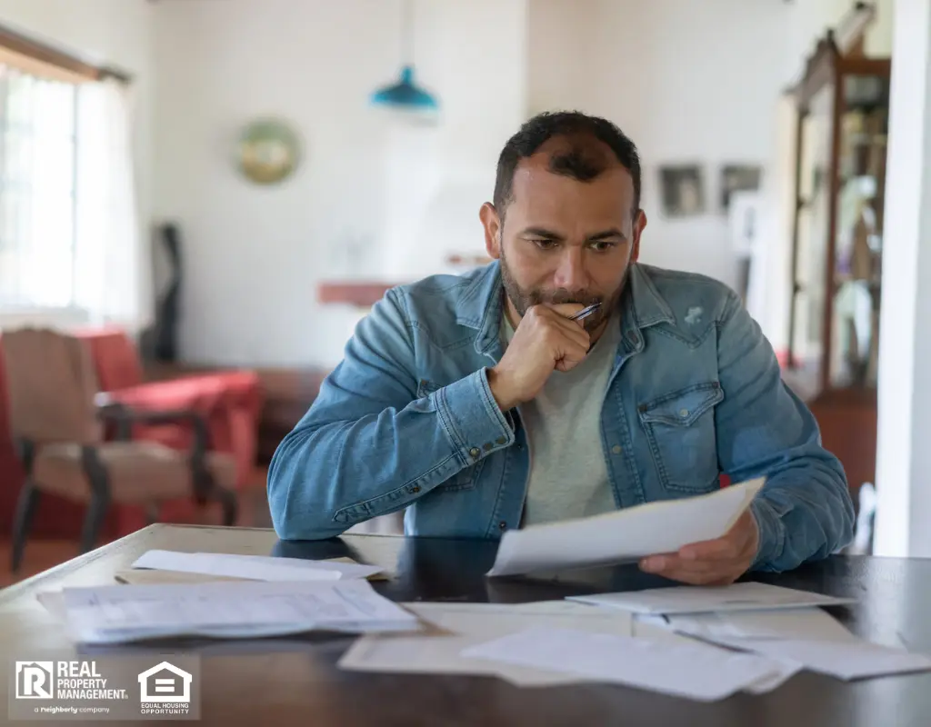 Worried Individual Reviewing Finances