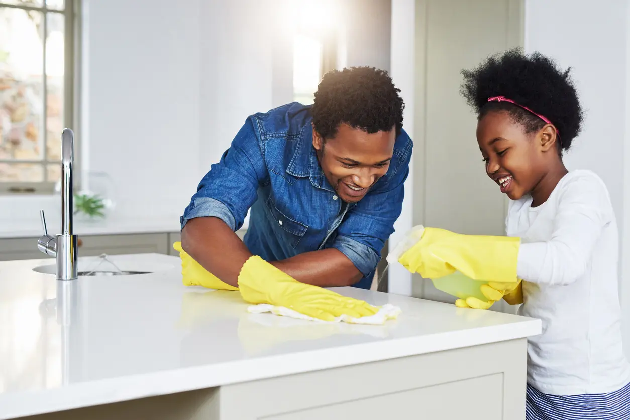 La Plata Family Cleaning the Kitchen